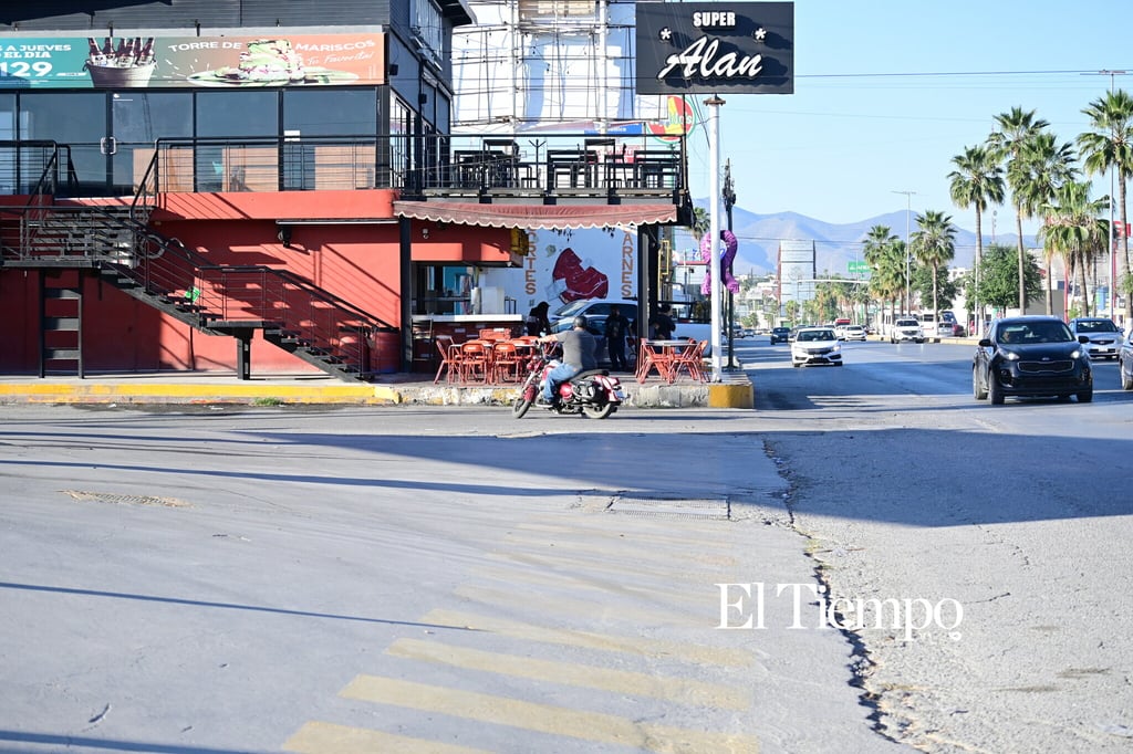 Galería fotográfica: Calor y frío transforman el ritmo en una misma avenida